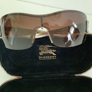 Authentice Burberry Sunglasses with plaid arms excellent condition